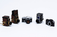 Miniature Nikon F's with Rolleiflex Rangefinders