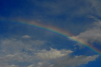 Rainbow in Blue Sky